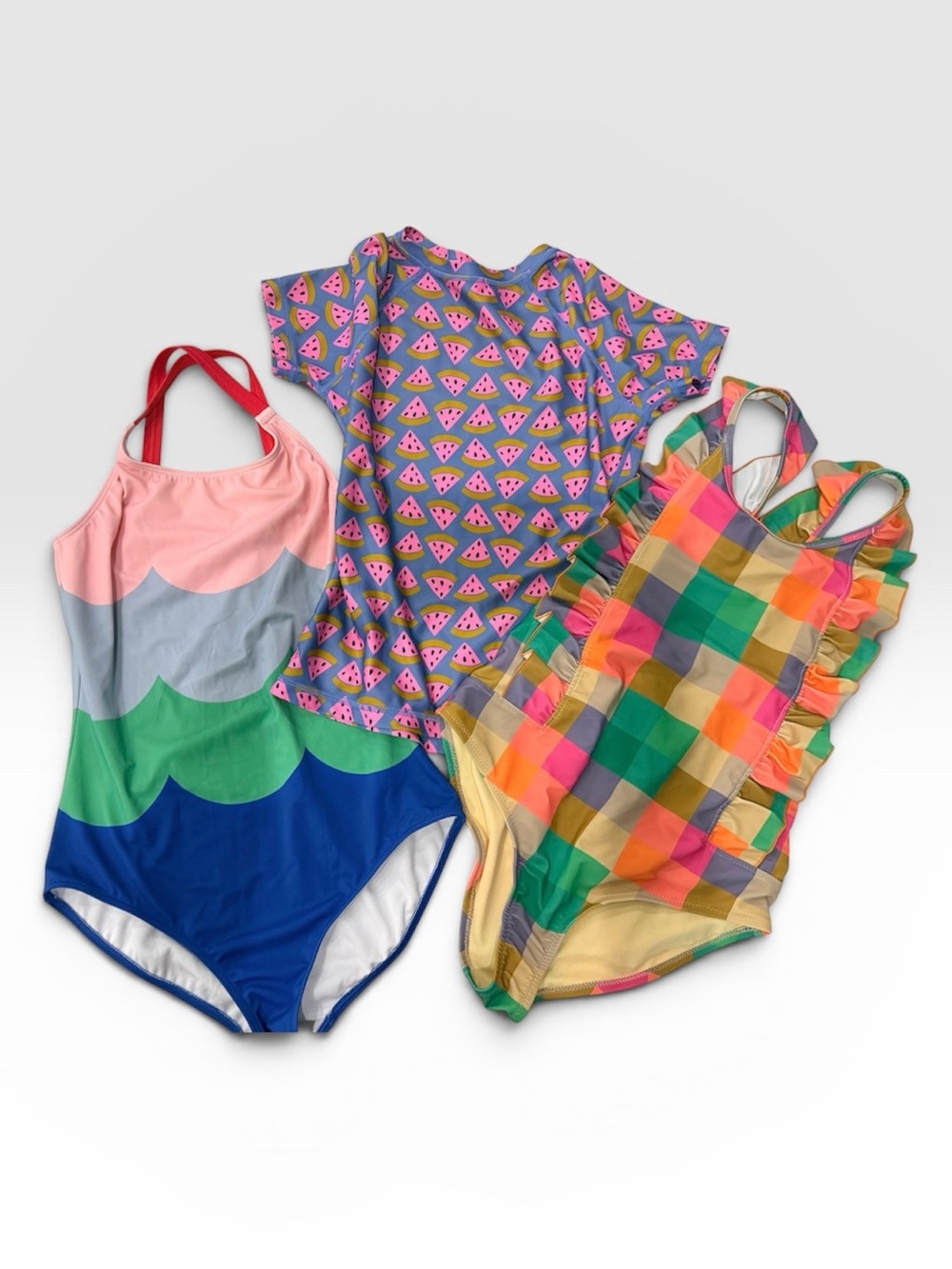 Girls swimwear lot: Pink Chicken, Mini Boden and Tea.